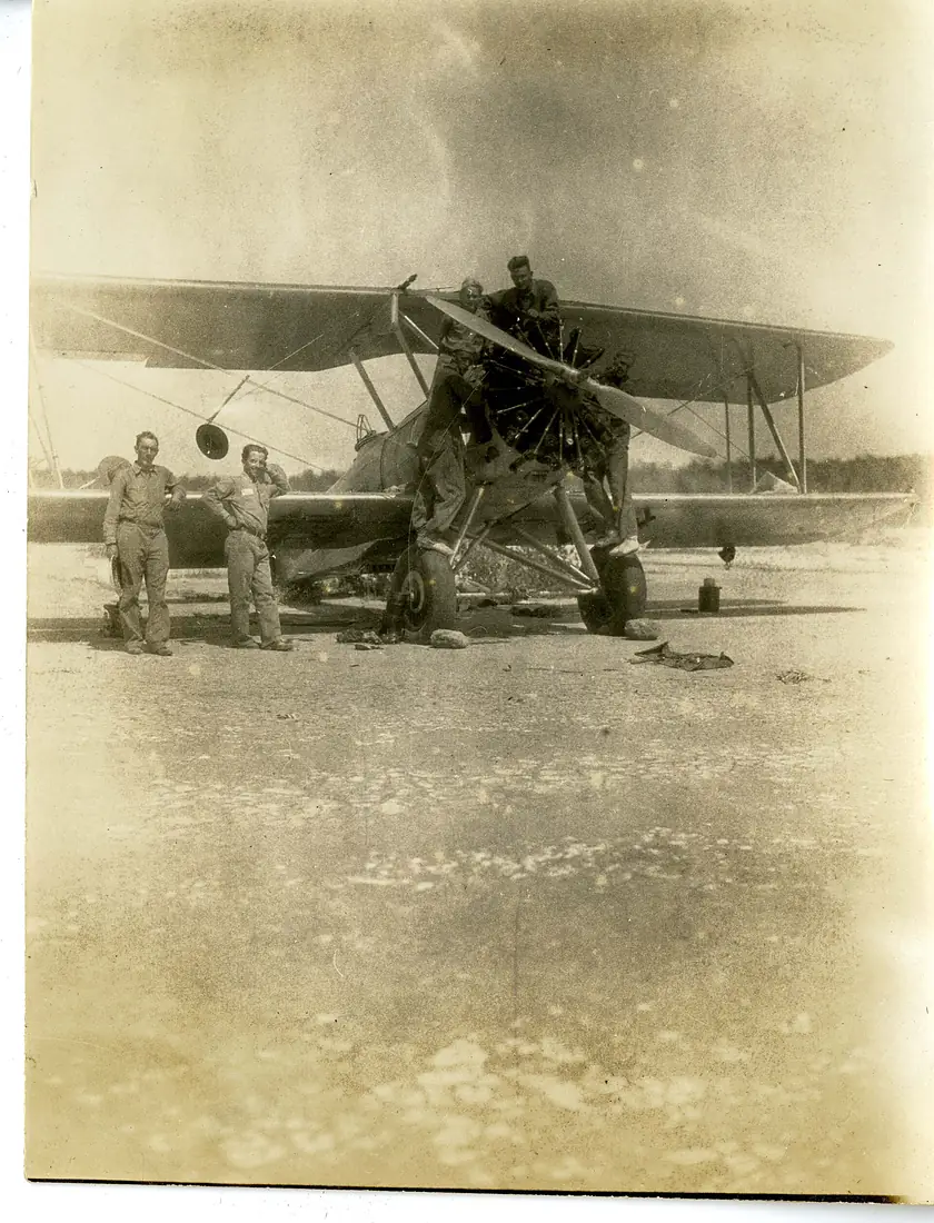 Repairing plane on Island of La Gonave, Haiti (15653664632)