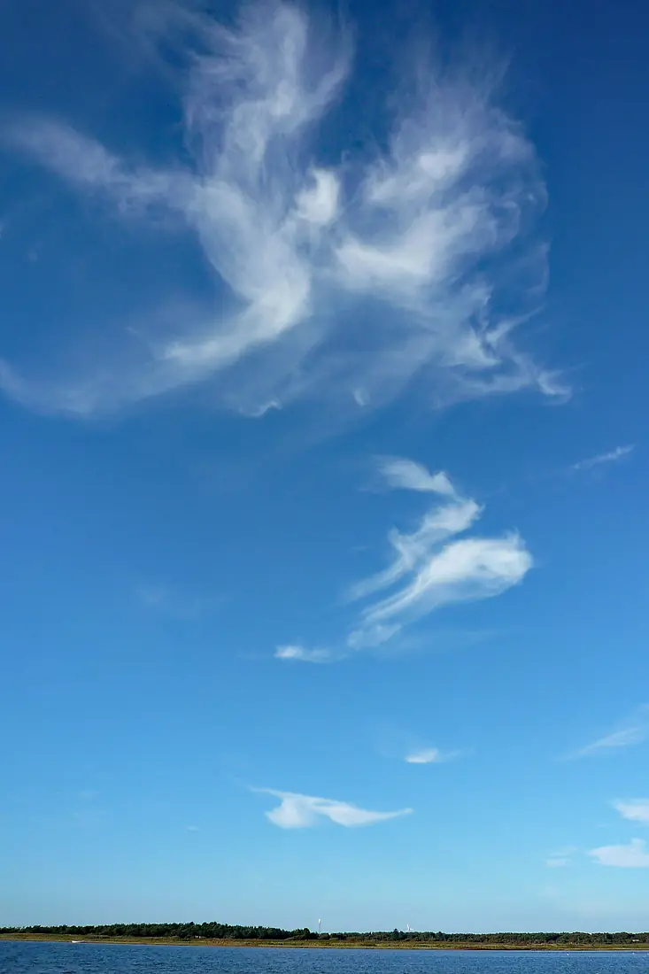 Featherlike clouds dancing over Læsø island, Denmark