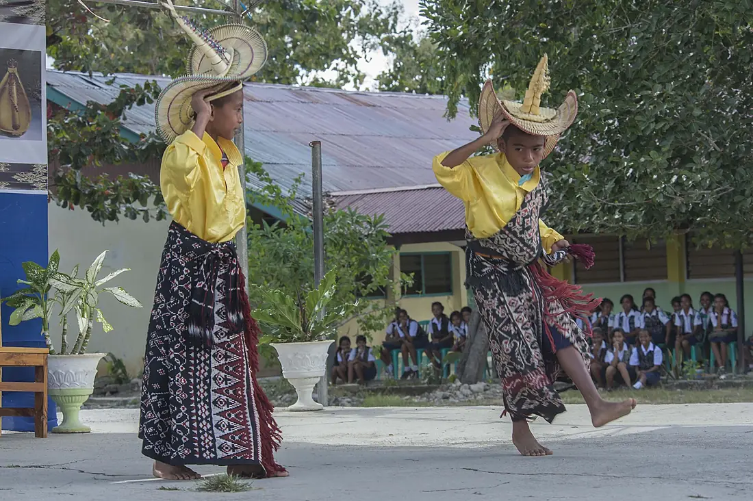 Children from the SMP Negeri Primary School on Rote Island perform the “Dance of 40”