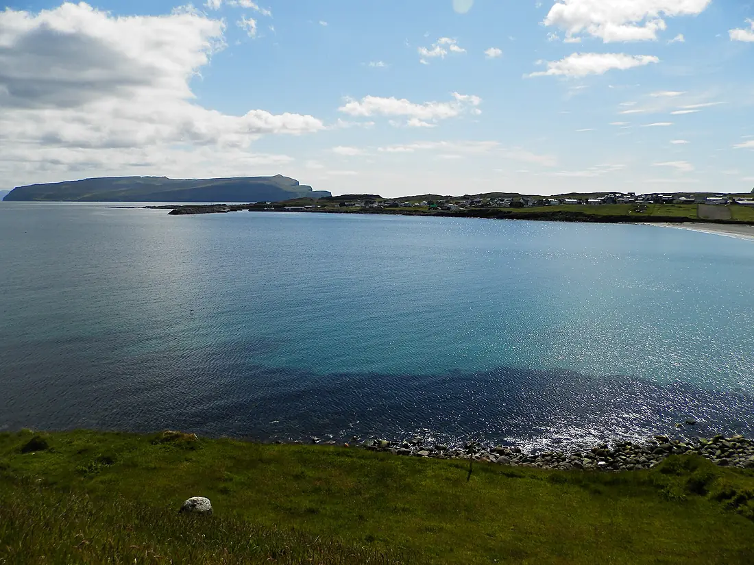 Sandur village on Sandoy, Skúvoy in the back ground 2012