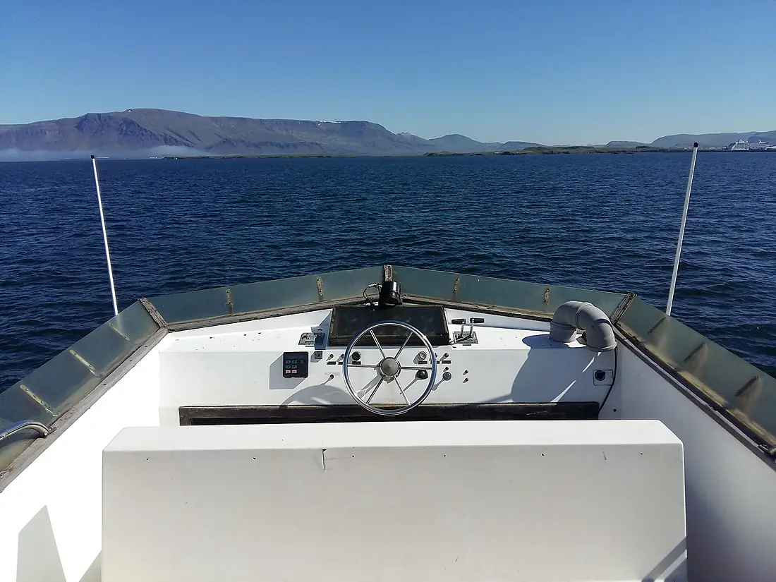 Ferry to the Viðey island with Esja mountain